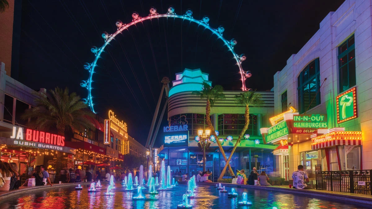 Aerial night view of the LINQ Hotel and Las Vegas Strip from the High Roller